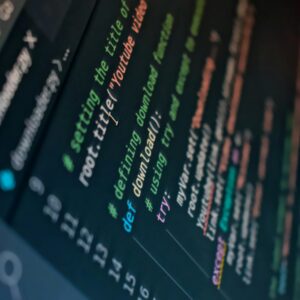 Detailed view of computer code highlighting syntax in colors on a screen.